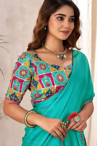 Turquoise kutchi embroidery satin designer saree