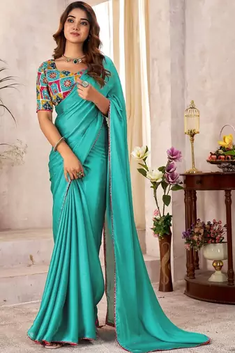 Turquoise kutchi embroidery satin designer saree