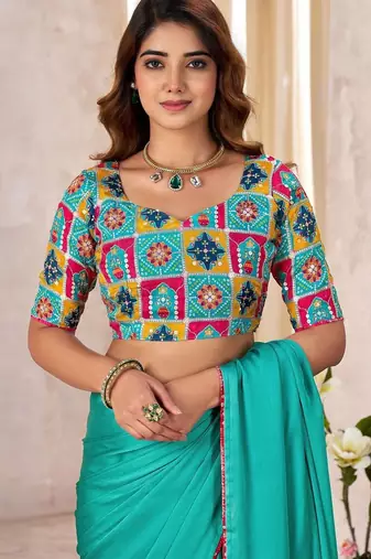 Turquoise kutchi embroidery satin designer saree