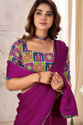 Purple sequinned satin saree