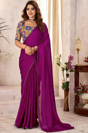 Purple sequinned satin saree