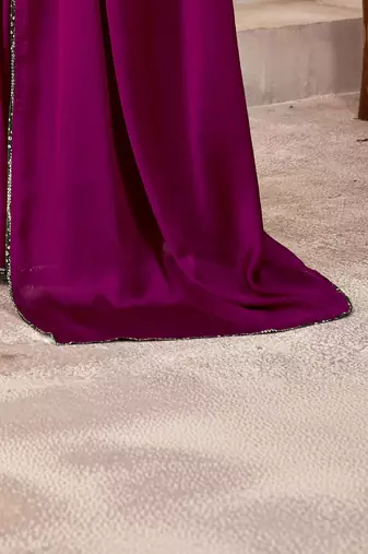Purple sequinned satin saree