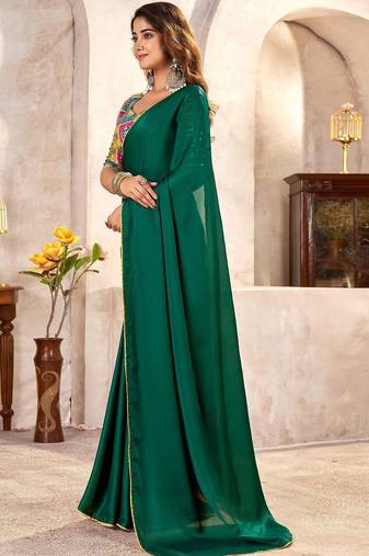 Green sequinned satin heavy work saree