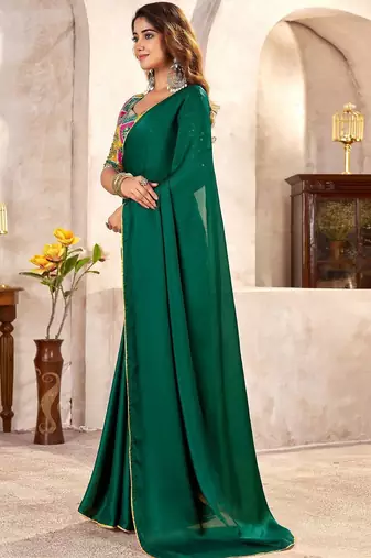 Green sequinned satin heavy work saree
