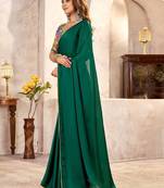 Green sequinned satin heavy work saree