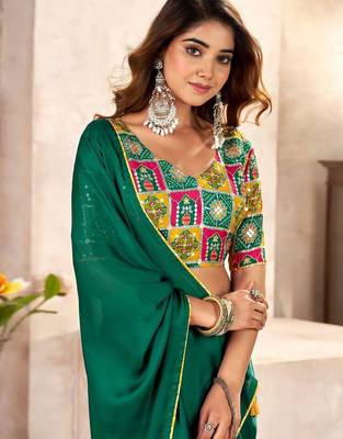 Green sequinned satin heavy work saree 2