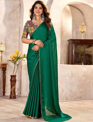 Green sequinned satin heavy work saree 3