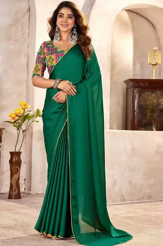 Green sequinned satin heavy work saree
