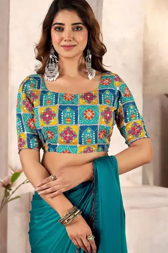 Teal kutchi embroidery satin saree