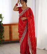 Red ethnic motifs embroidered saree