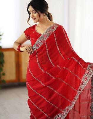 Red ethnic motifs embroidered saree 5