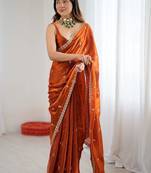 Rust embellished embroidered satin designer saree