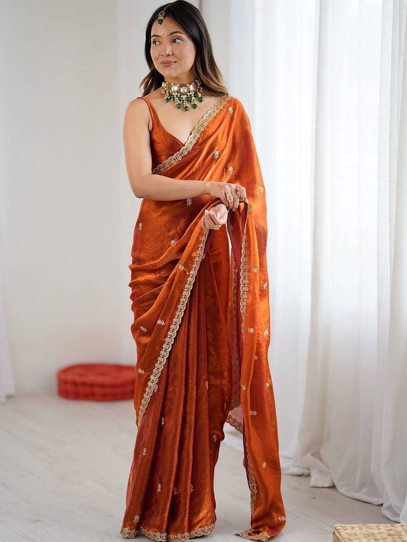 Rust embellished embroidered satin designer saree