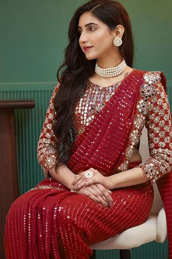 Red embellished sequinned  georgette saree