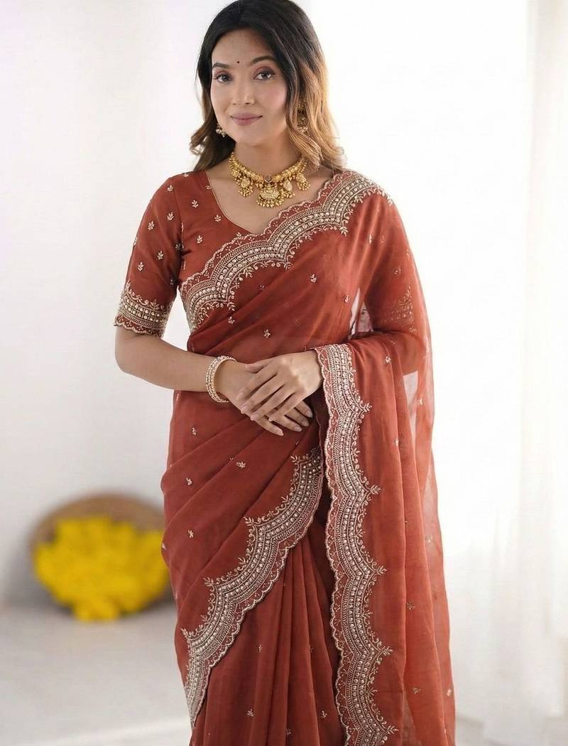 Rust embroidered poly georgette designer saree