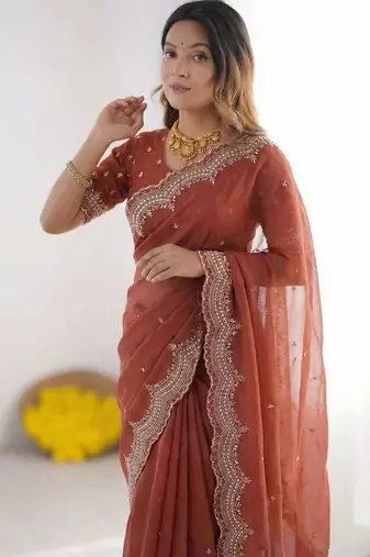 Rust embroidered poly georgette designer saree