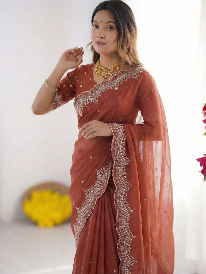 Rust embroidered poly georgette designer saree