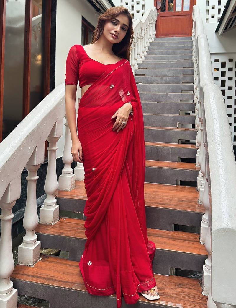 Red embellished sequinned  chiffon saree