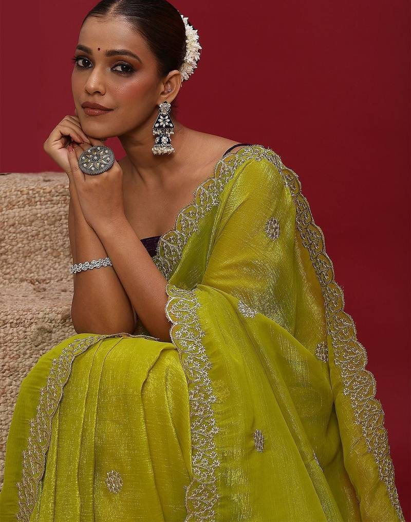 Lime embellished embroidered tissue saree
