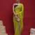 Lime embellished embroidered tissue saree