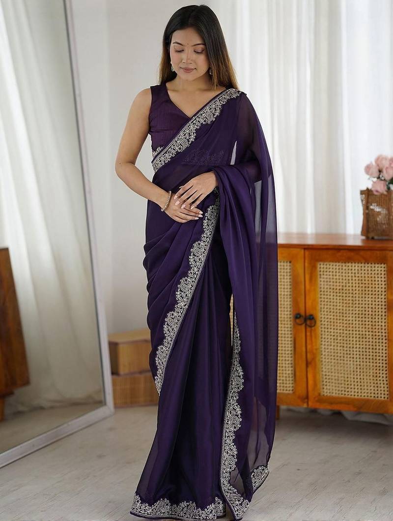 Purple embroidered border saree