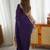 Purple embroidered border saree