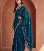 Teal embroidered tissue saree
