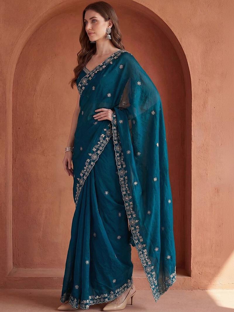 Teal embroidered tissue saree