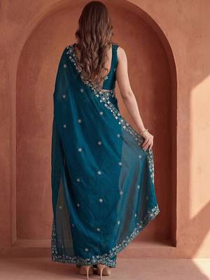 Teal embroidered tissue saree 5