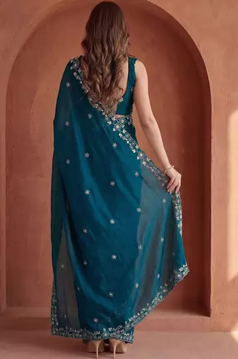Teal embroidered tissue saree