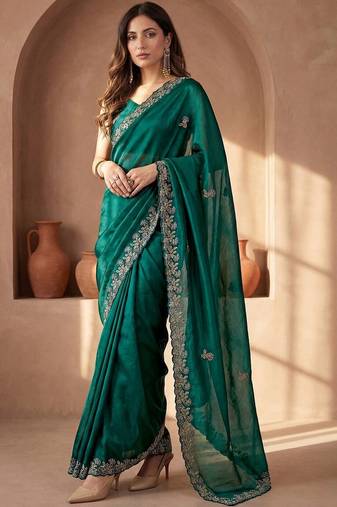Green embroidered tissue saree