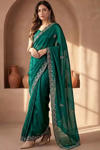 Green embroidered tissue saree