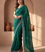 Green embroidered tissue saree