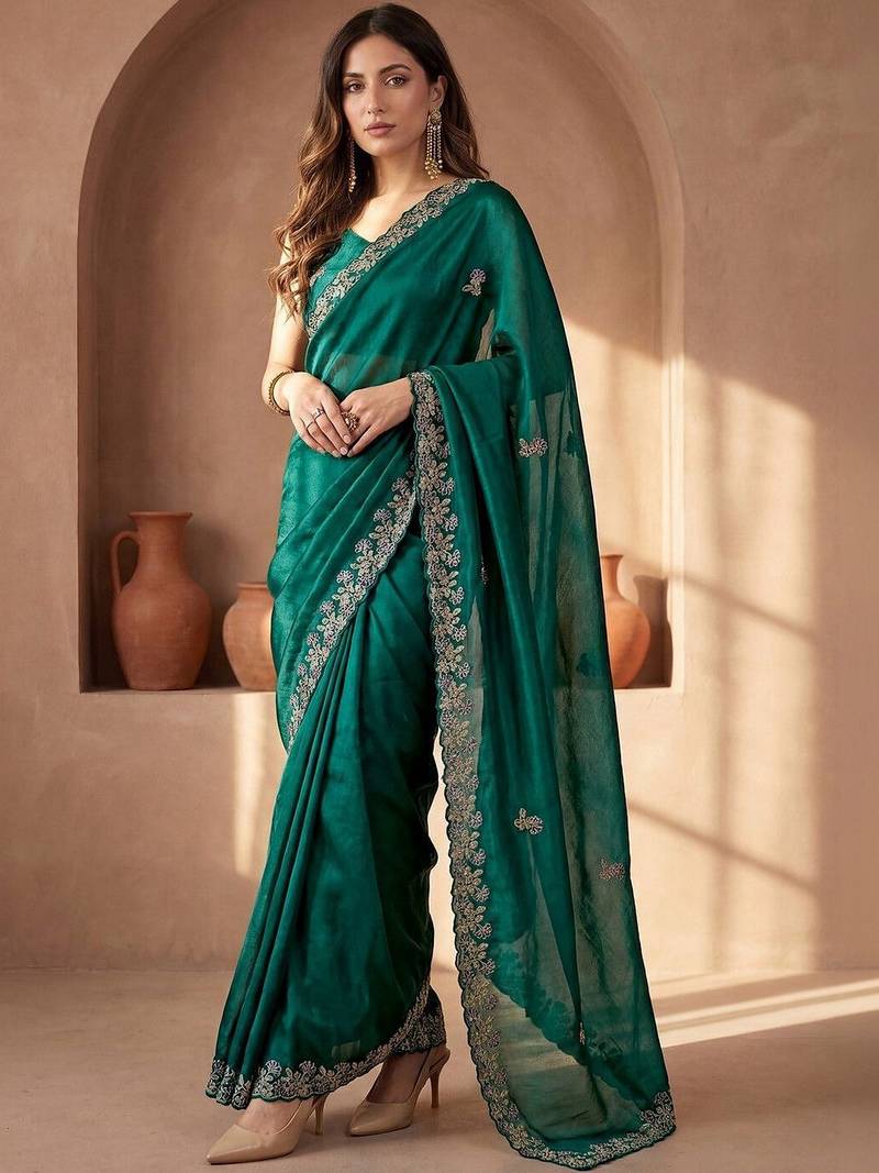 Green embroidered tissue saree
