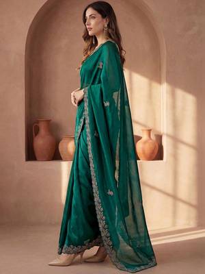 Green embroidered tissue saree 3