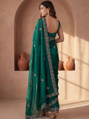 Green embroidered tissue saree 4