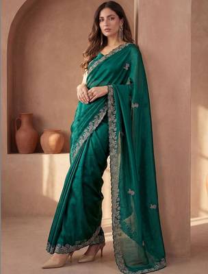 Green embroidered tissue saree 5