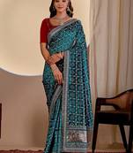 Teal bandhani embroidered silk blend designer saree