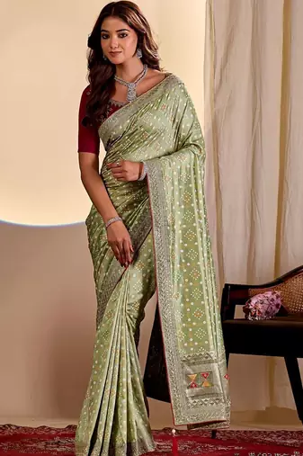 Green woven design zari saree with blouse piece