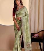 Green woven design zari saree with blouse piece