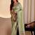 Green woven design zari saree with blouse piece