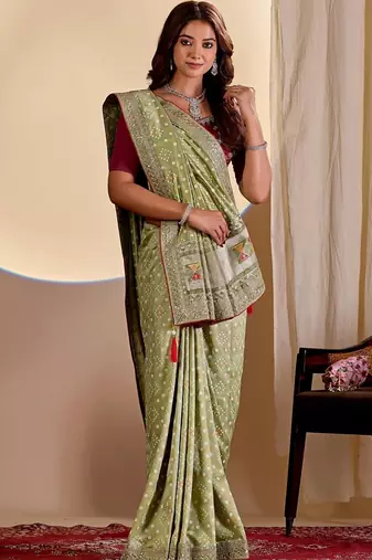 Green woven design zari saree with blouse piece