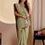 Green woven design zari saree with blouse piece