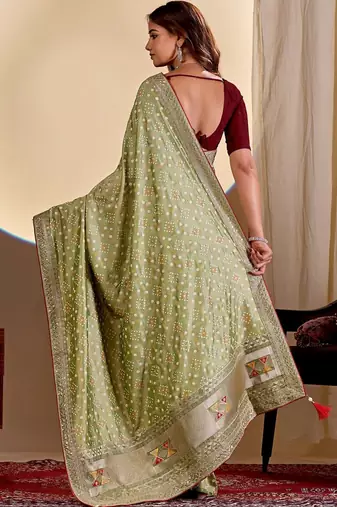 Green woven design zari saree with blouse piece