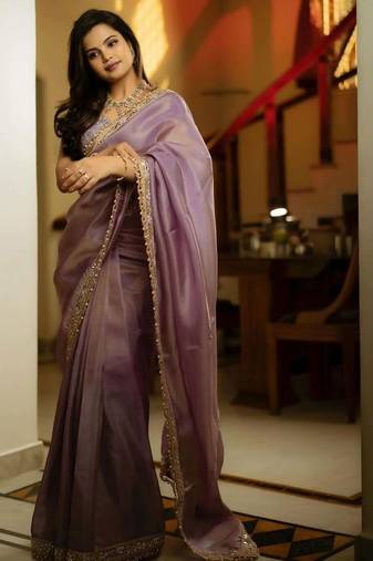 Lavender embellished zari net heavy work saree