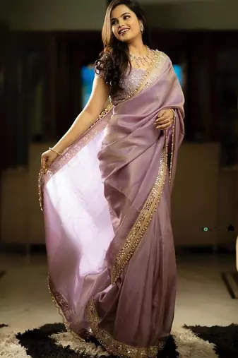 Lavender embellished zari net heavy work saree