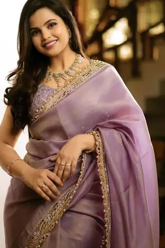 Lavender embellished zari net heavy work saree