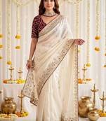 Off white ethnic motifs embroidered satin designer saree