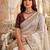 Off white ethnic motifs embroidered satin designer saree