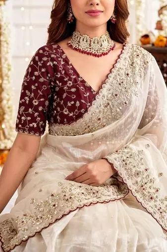 Off white ethnic motifs embroidered satin designer saree